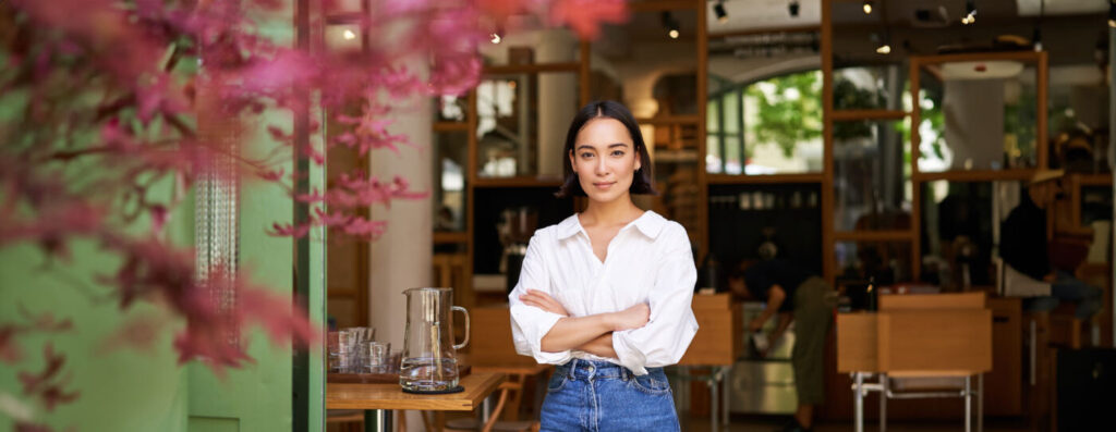 Founder standing in her small business