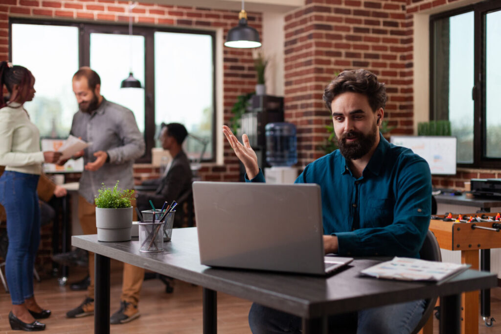 Entrepreneur reviewing marketing statistics on a video call